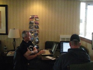 Working away... Chris and I busy working in the Inn America Lobby...